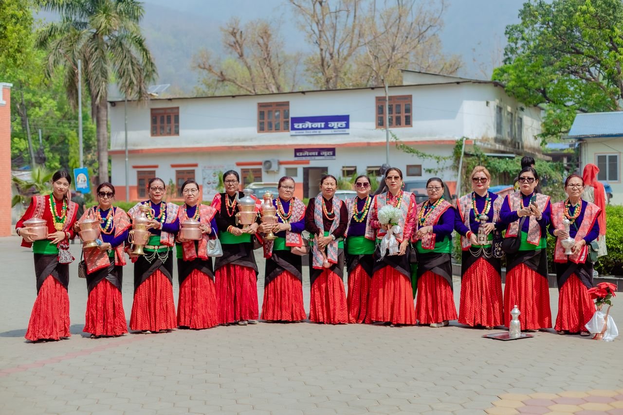 Group of Nepali women in vibrant traditional attire performing a cultural ceremony in Butwal.